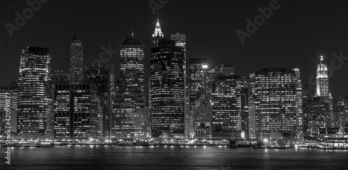 Manhattan skyline at night from Brooklyn, New York. © Danita Delimont
