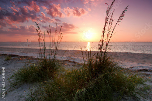 Sunset at Jekyll Island. Jekyll is located off the coast of the U.S. state of Georgia, in Glynn County. It is one of the Sea Islands and one of the Golden Isles of Georgia barrier islands. photo