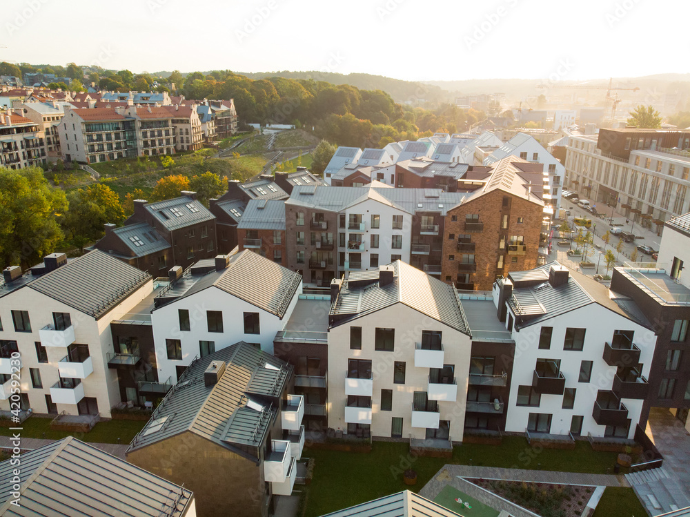 Obraz premium Aerial view of residential area in Vilnius, Lithuania. New modern apartment complex. Low rise european apartment building complex.