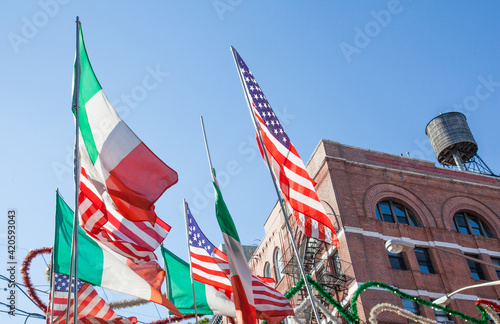 Little Italy, Manhattan, New York. American and Italian flags flying.