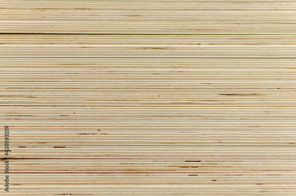 Sheet plywood is stacked in rows. Sheet plywood is stacked in rows.