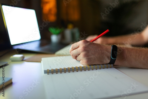 Wallpaper Mural Anonymous Man Taking Notes In A Notebook Torontodigital.ca