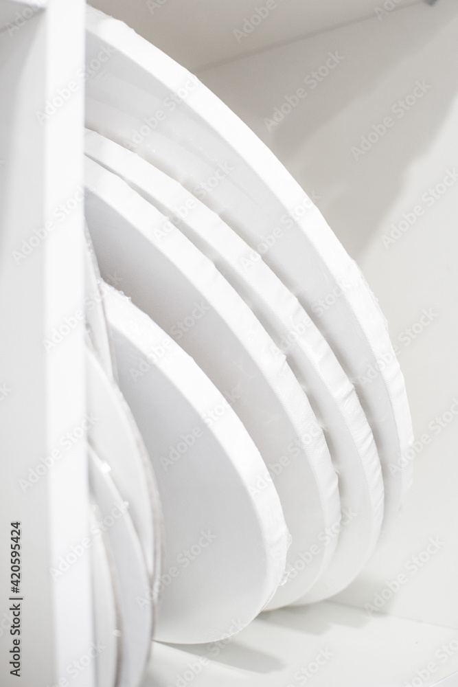 Fototapeta premium Abstract image of white on white. Combination of round shapes. Artistic reception. High quality photo