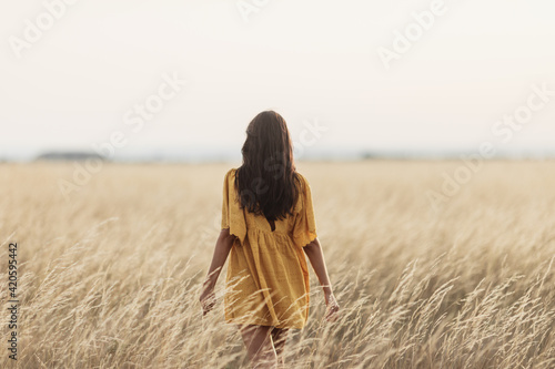 Portraits of woman at sunset.