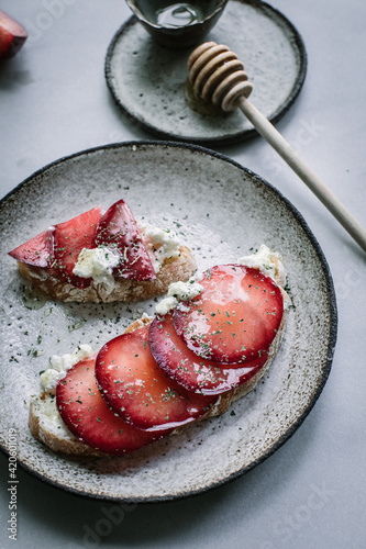 Fresh Organic Pluots on Ricotta and Toast photo