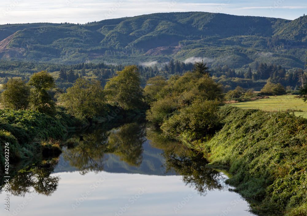 USA, Oregon, Nehalem. Morning landscape with mountain and river.