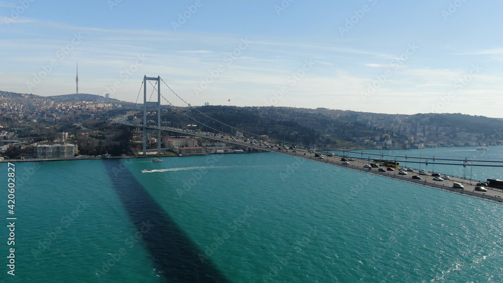 Istanbul Bosphorus Bridge, 15 July Martyrs Bridge from Sky Aerial view. suspension bridge vehicle traffic  