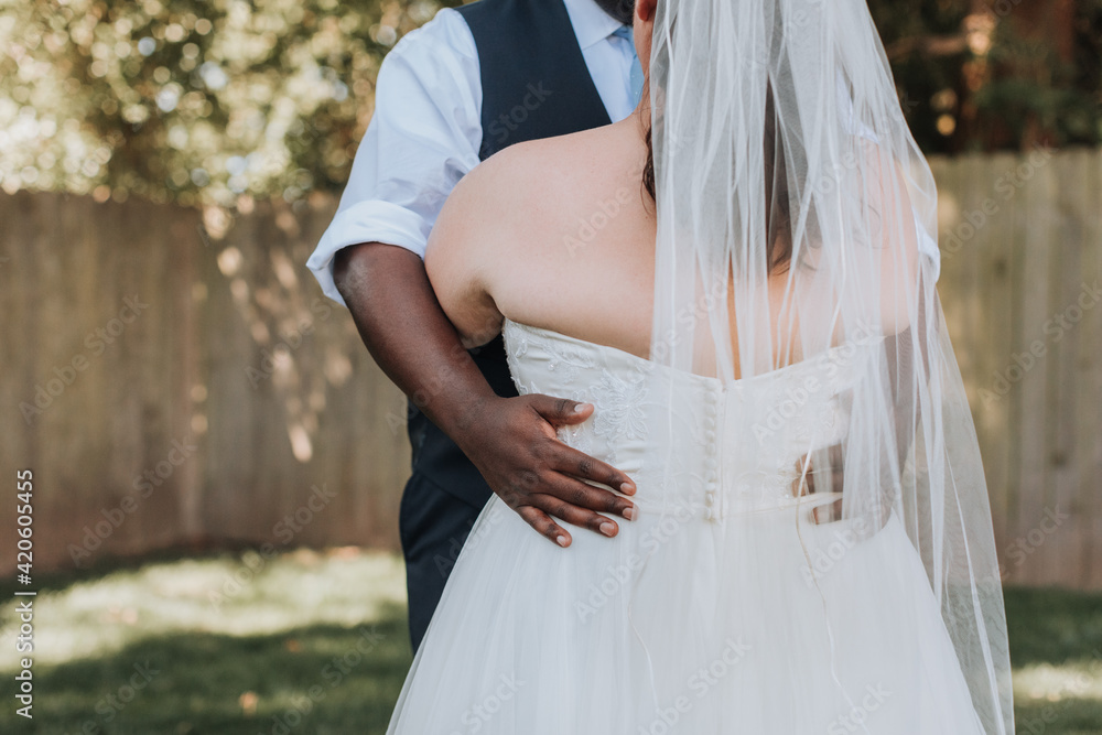 Bride and Groom Hugging at Wedding Bride and Groom Hugging at Wedding