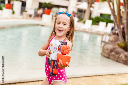 cute girl with watergun photo