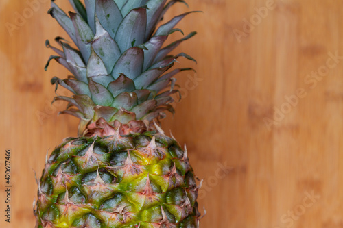 pineapple on wooden background