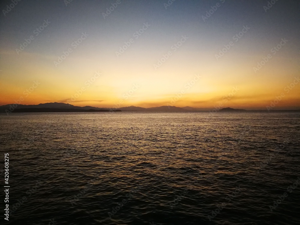 sunset over the sea sunset over the sea