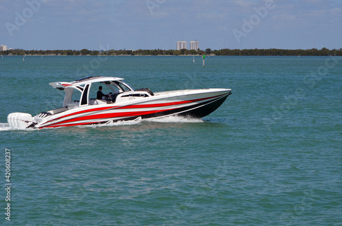 Ocean race boat cruising on the Florida Intra-Coastal Waterway off of Miami Beach