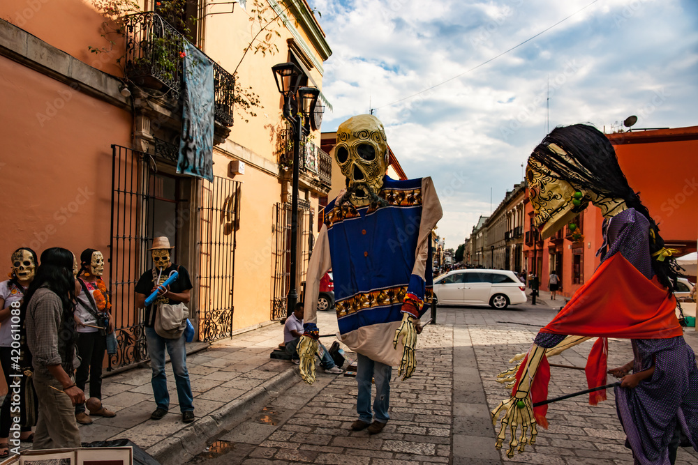 Lively Street Performers with Paper Mache Masks Lively Street Performers with Paper Mache Masks
