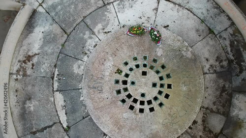 Bojiste, Bosnia and Herzegovina - July 15, 2019 Concrete monument Spomenik na Korcanici in Grmec mountain - move up of middle of the concrete monument photo