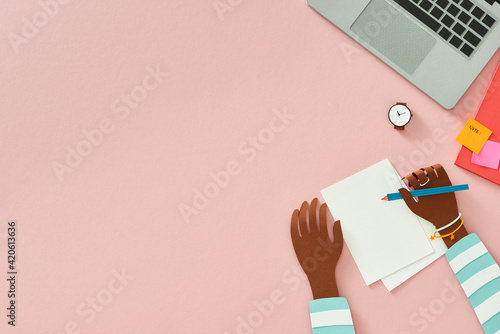 Woman hands writing in notebook, digital work, view from above. Creative workplace in office