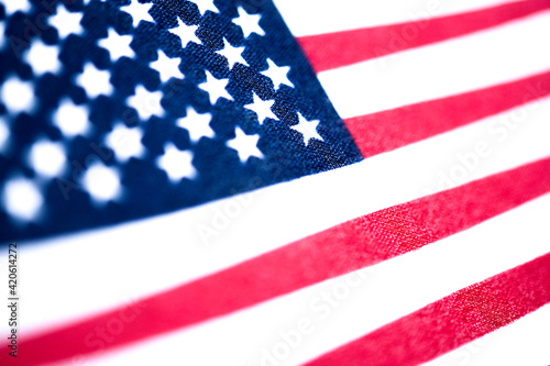 Macro Shot Of Handheld American Flag On Coarse Fabric