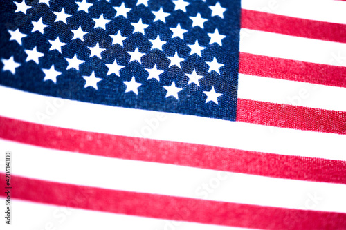 Macro Shot Of Handheld American Flag On Coarse Fabric