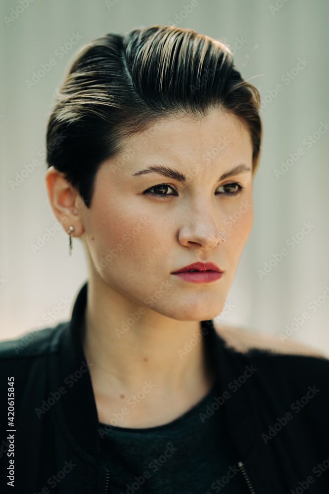 brunette woman with black casual wear on the street brunette woman with black casual wear on the street