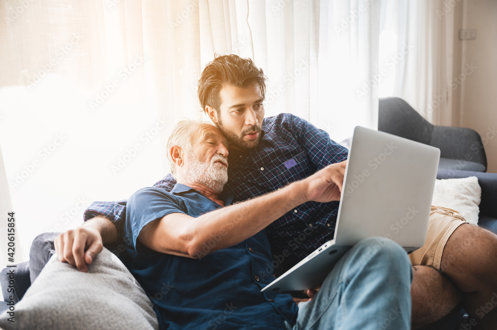 senior father hugging adult son, aged father and hipster son living together at home, hug and happy relation lifestyle, fatherhood activity indoor at the house, 2 man person family elderly generation senior father hugging adult son, aged father and hipster son living together at home, hug and happy relation lifestyle, fatherhood activity indoor at the house, 2 man person family elderly generation