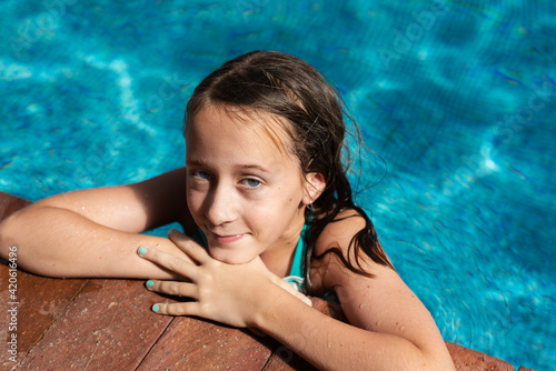tween girl in pool