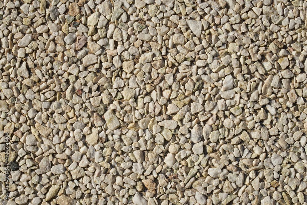 A wall of granite stones as a background. A wall of granite stones as a background.