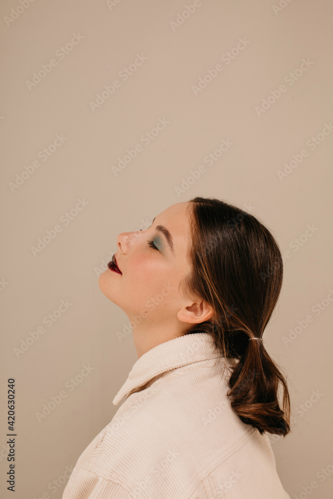 Profile portrait of teenage girl with make up Profile portrait of teenage girl with make up