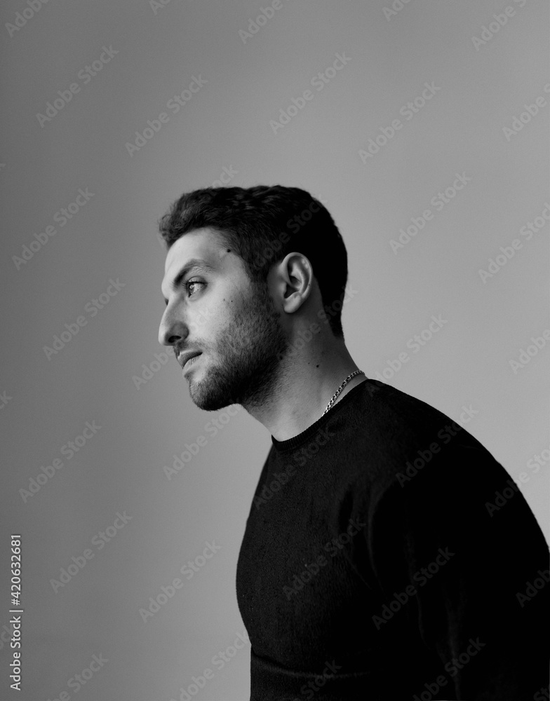 Portrait of a young beautiful man indoors Portrait of a young beautiful man indoors