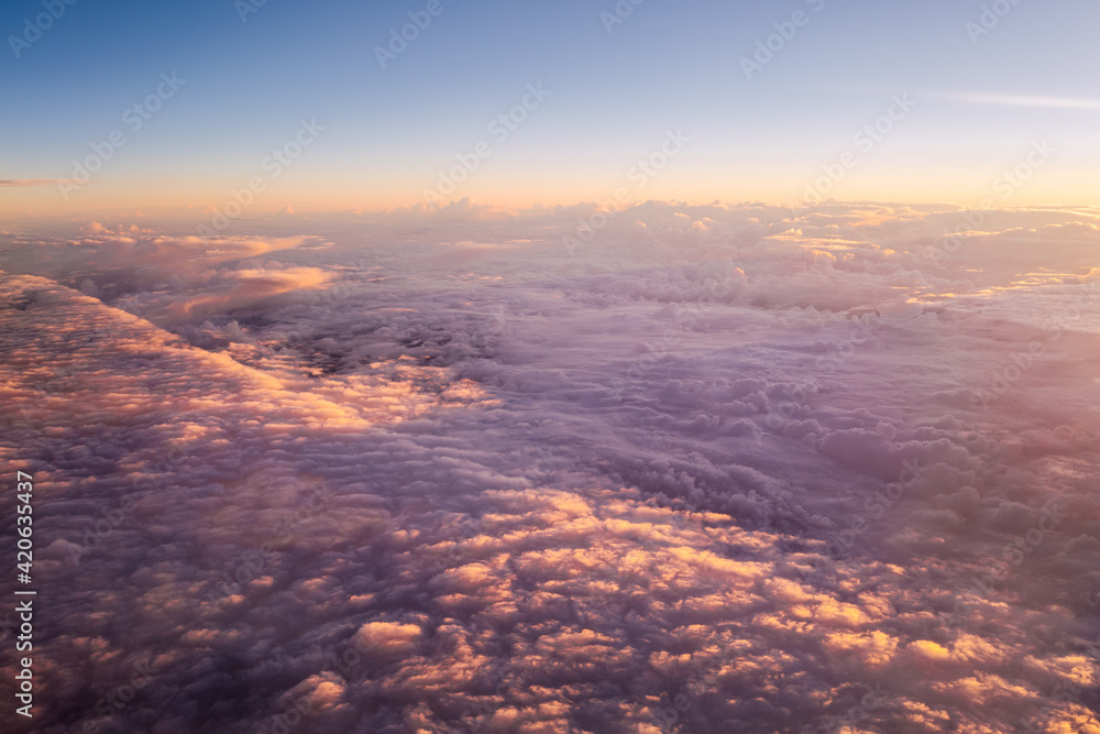 Sunrise clouds, viewed from above Sunrise clouds, viewed from above