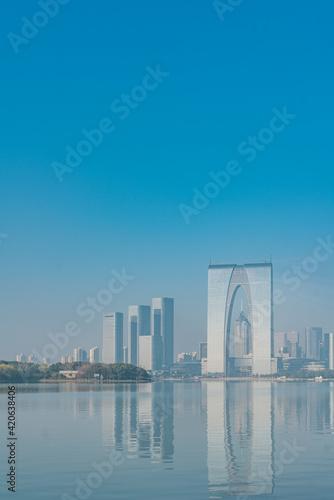 The modern skyline and Jinji lake in Suzhou  Jiangsu province  China.