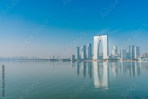 The modern skyline and Jinji lake in Suzhou  Jiangsu province  China.
