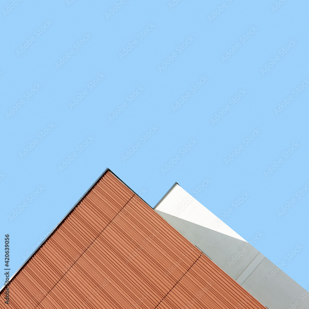 © Vaidas Bucys/Stocksy - Abstract minimalist architecture detail against blue sky © Vaidas Bucys/Stocksy - Abstract minimalist architecture detail against blue sky