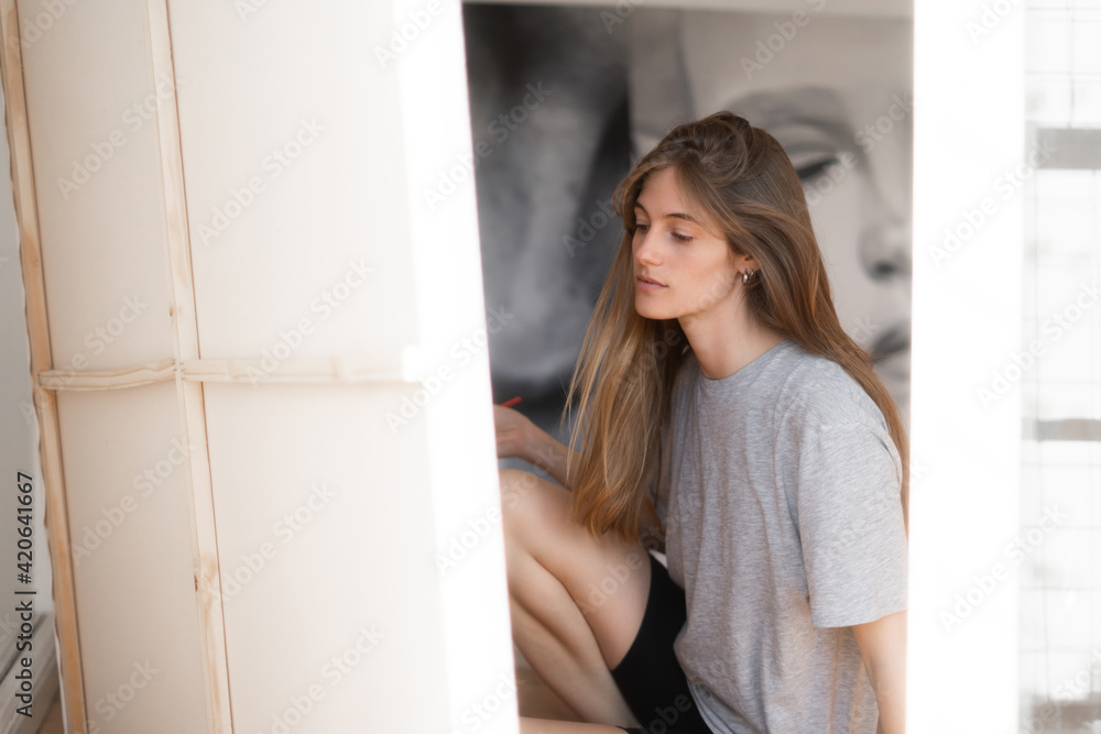 artist painting on a canvas artist painting on a canvas