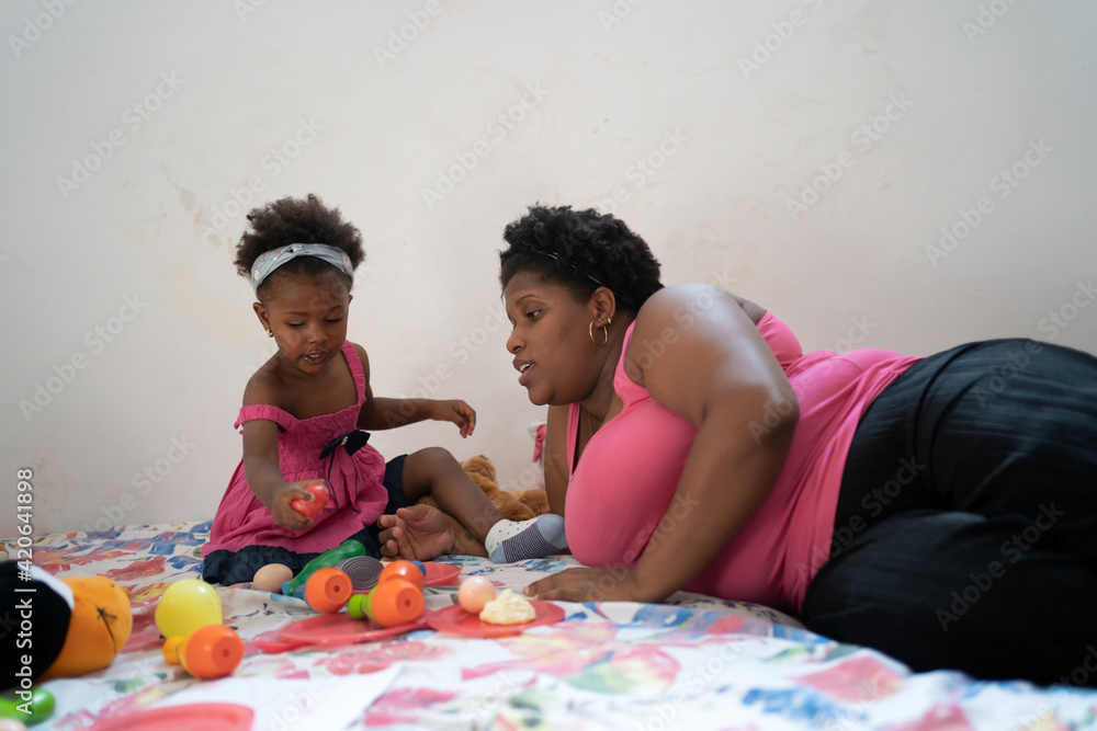 Daughter And Mother Playing At Home. Daughter And Mother Playing At Home.