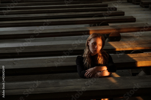 A girl in an abandoned Church