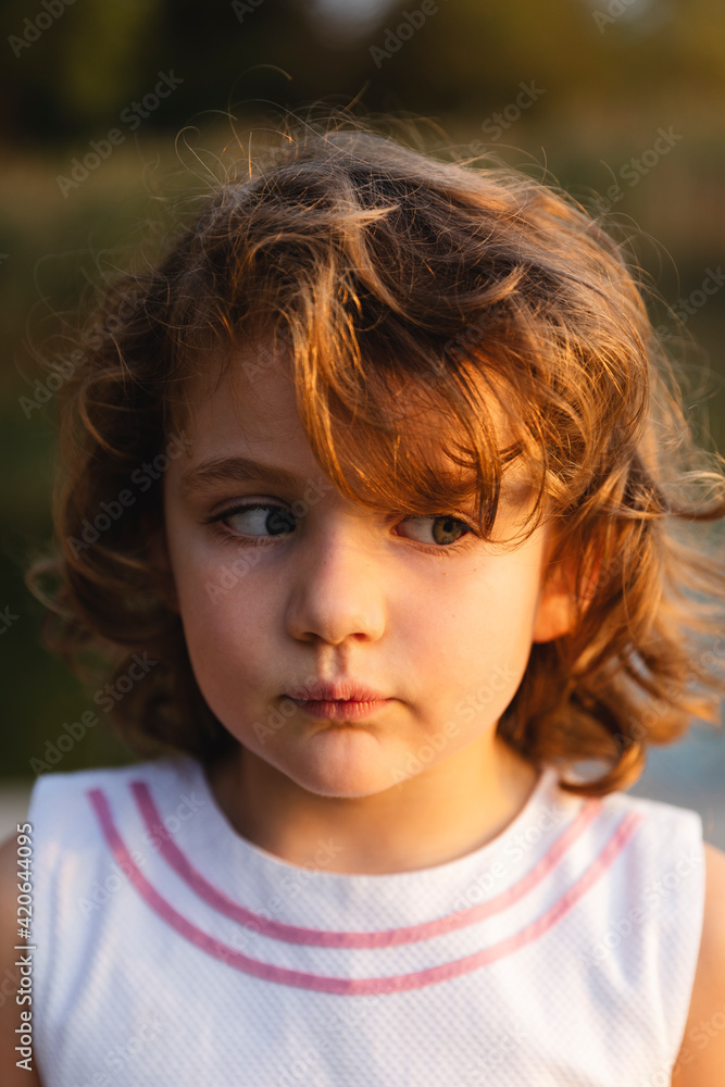 Funny portrait of beautiful little girl