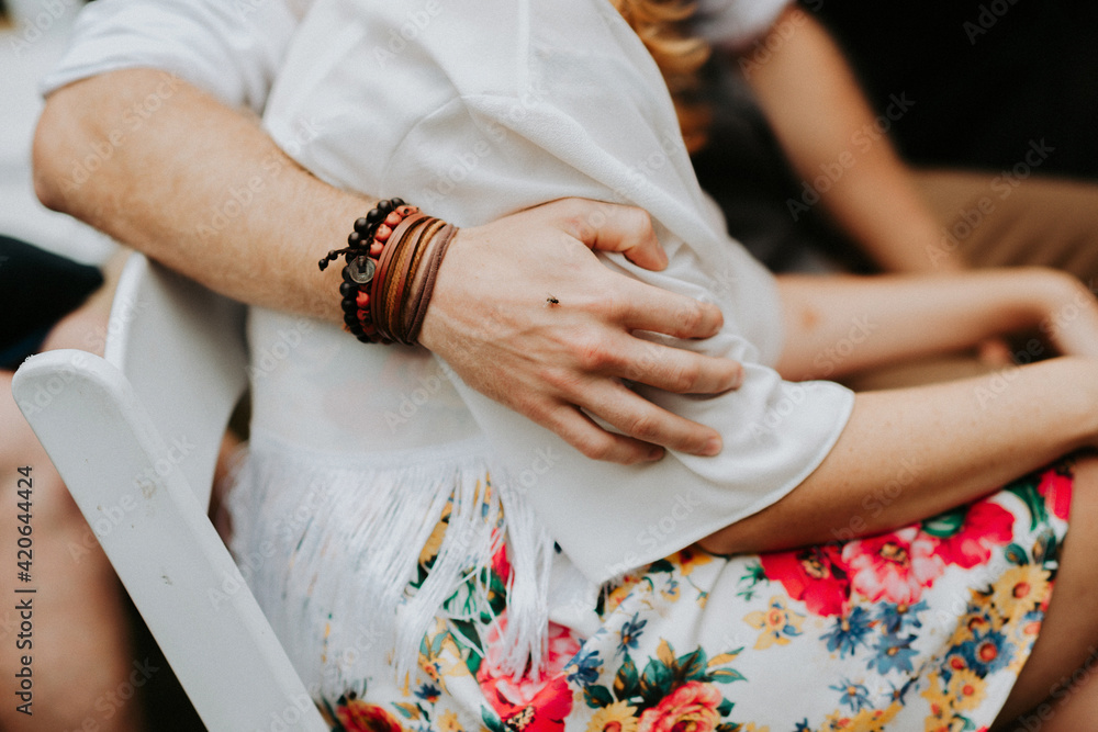 © Melissa Milis Photography/Stocksy - boy holding his arm around his girl and mosquito sitting on his hand © Melissa Milis Photography/Stocksy - boy holding his arm around his girl and mosquito sitting on his hand