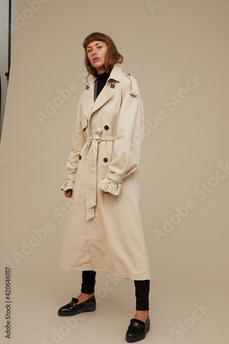 Stylish woman wearing an overcoat photo