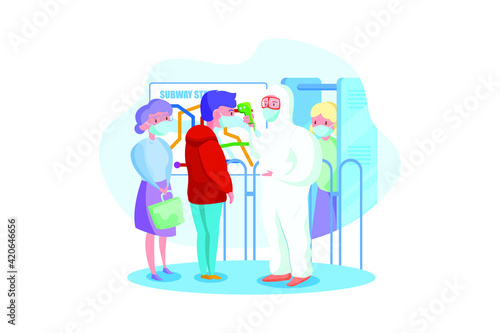 Specialist in hazmat suit checking passengers temperature at subway station. © freeslab