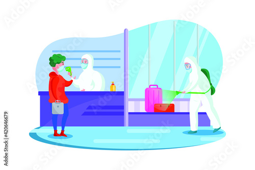Passenger health check and disinfectant spraying at the airport, passenger wearing mask and the officer wearing hazmat suit
