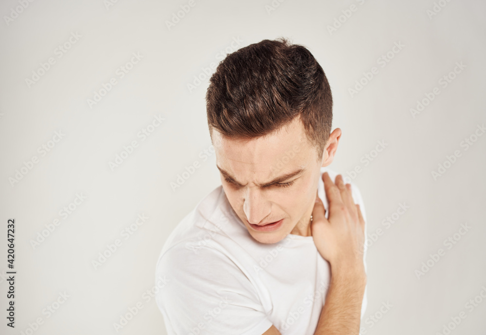 Male puzzled look face sleeves model white t-shirt Male puzzled look face sleeves model white t-shirt