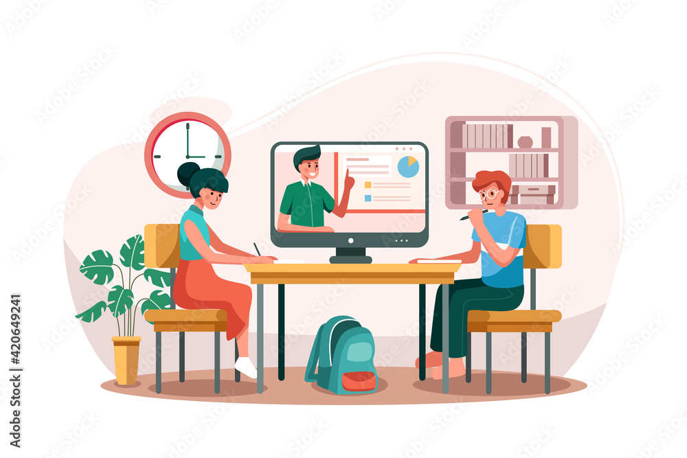 The boy and the girl learning online course on the table. The boy and the girl learning online course on the table.