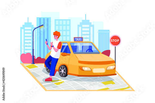 A man with a smartphone standing near the car. 