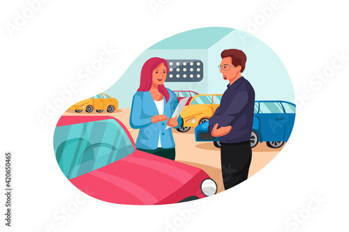 Salesperson showing vehicle to potential customer in dealership © freeslab