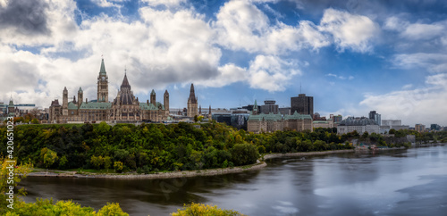 Panoramic view of Downtown Ottawa and the Parliament of Canada. Taken from Nepean Point, Ontario, Canada. Colorful Dramatic Sky Artistic Render