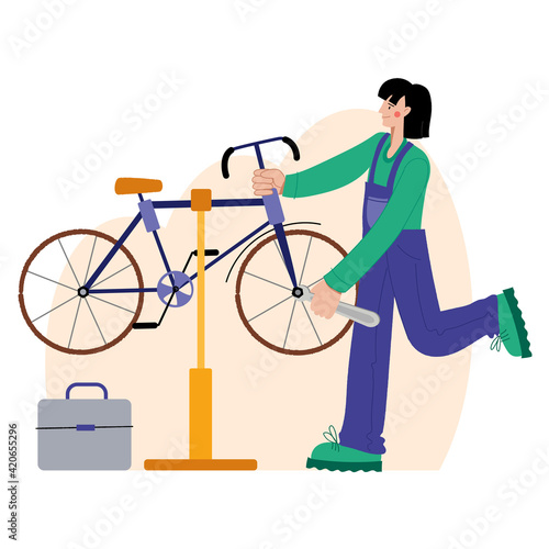 Bicycle repair. A woman repairs a bicycle. Web graphics, banners, advertisements, business templates