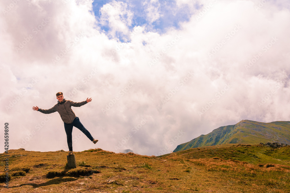 Summer Carpathians, tourists on top of the mountain of the Montenegrin ridge, children conquer the mountains, travel the Carpathians. Summer Carpathians, tourists on top of the mountain of the Montenegrin ridge, children conquer the mountains, travel the Carpathians.