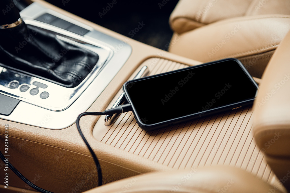 Charger plug phone on car. Power plug phone in car Charger plug phone on car. Power plug phone in car
