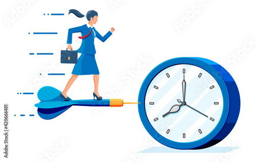 Businesswoman aim dart arrow to clocks target.