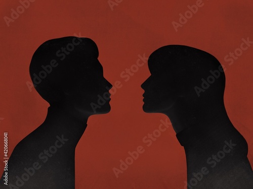 silhouettes of two lovers on a red background photo