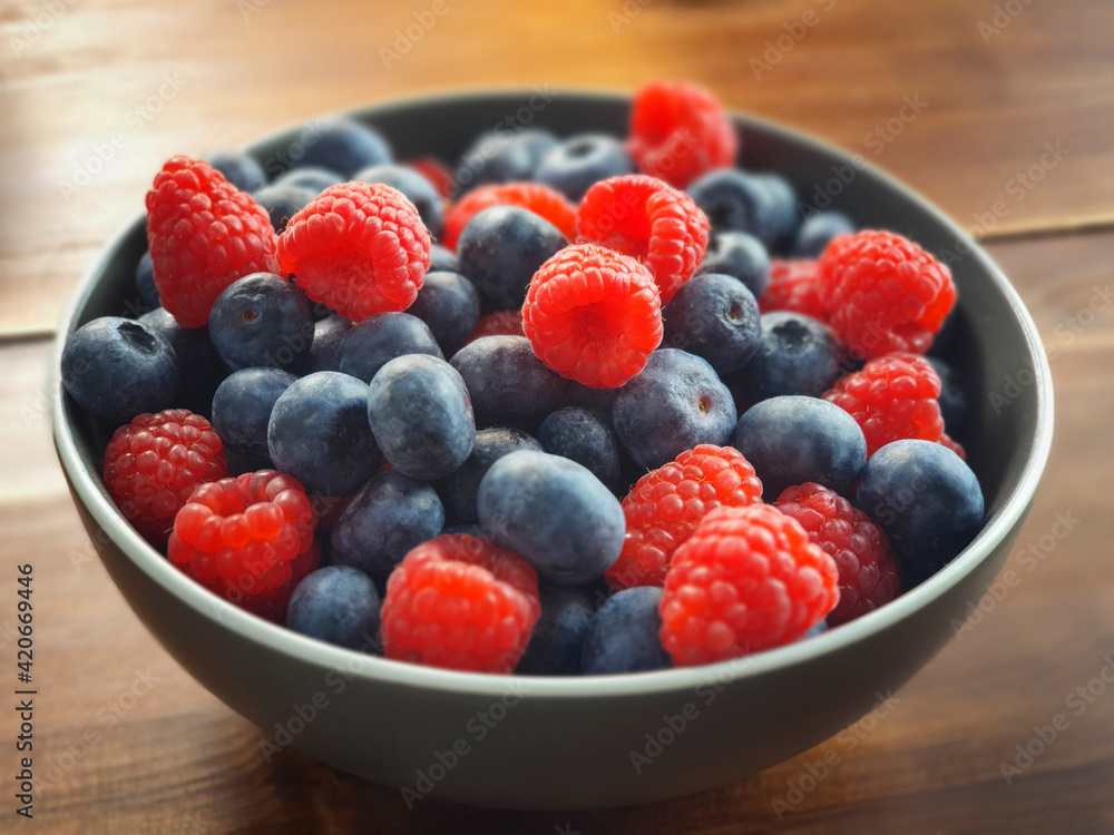 Fresh blueberries and raspberries Fresh blueberries and raspberries
